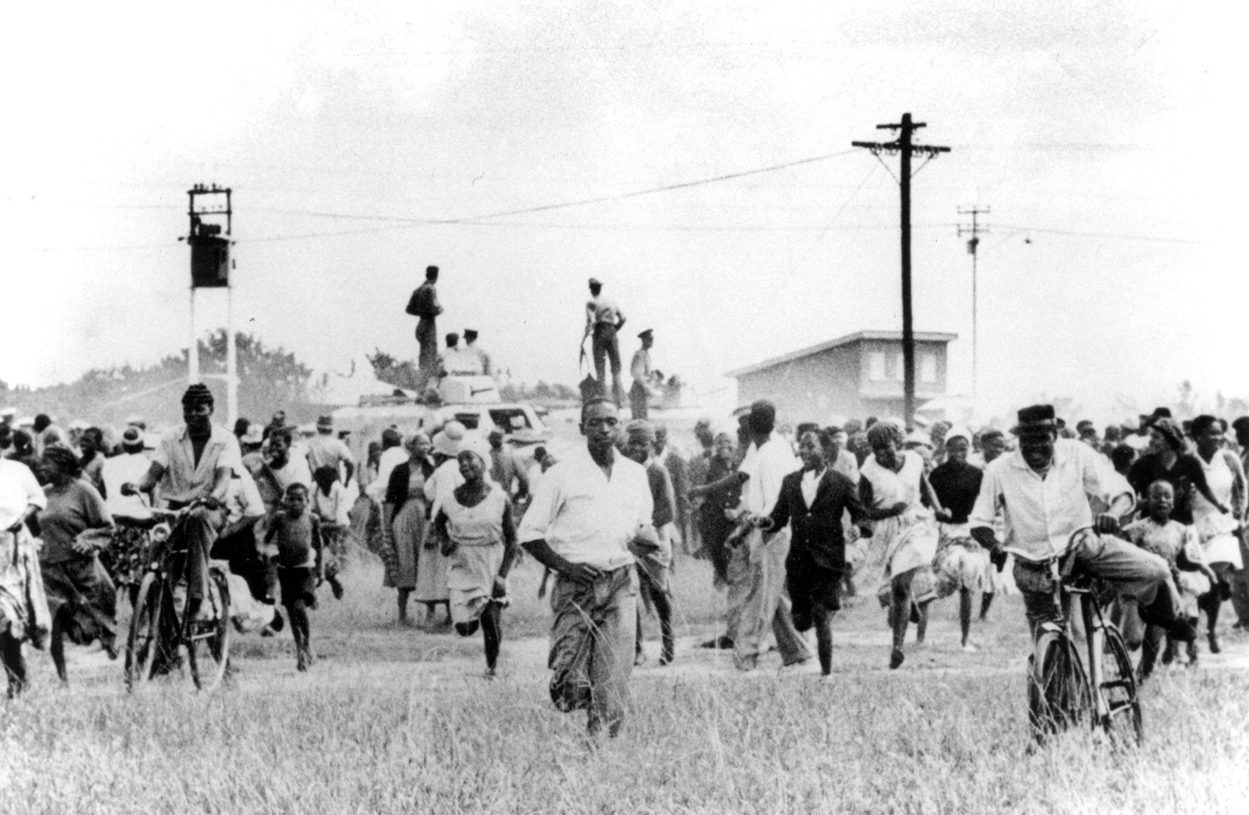 Protesters flee military vehicle