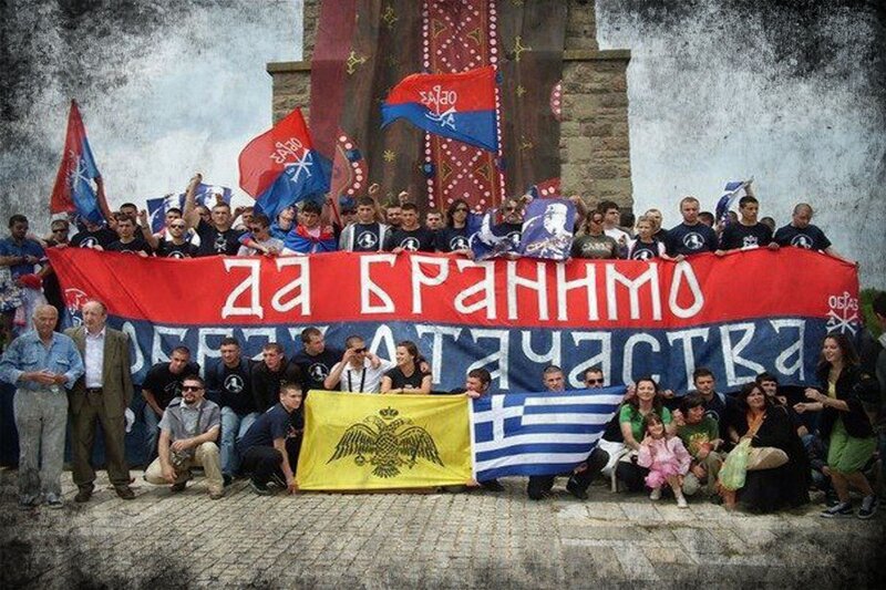 Protesters Holding Banner — Red