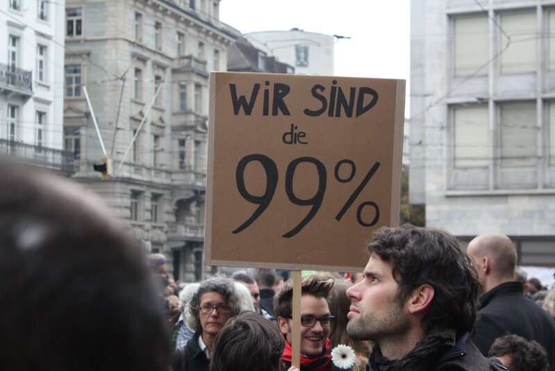 Protesters holding sign