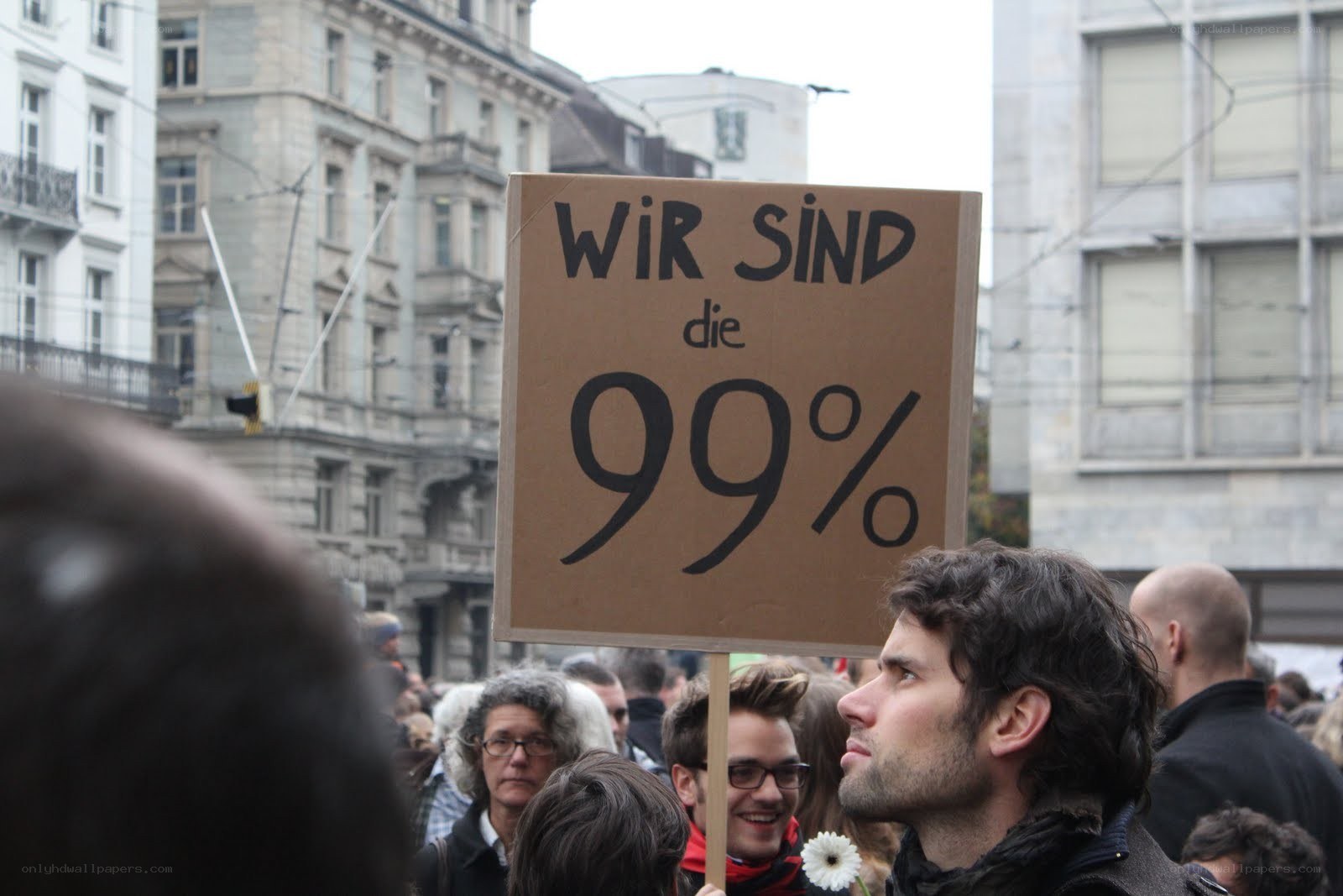 Protesters holding sign