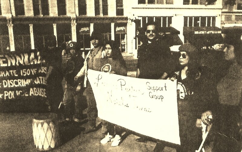 Protesters Holding Signs — Black, Serious