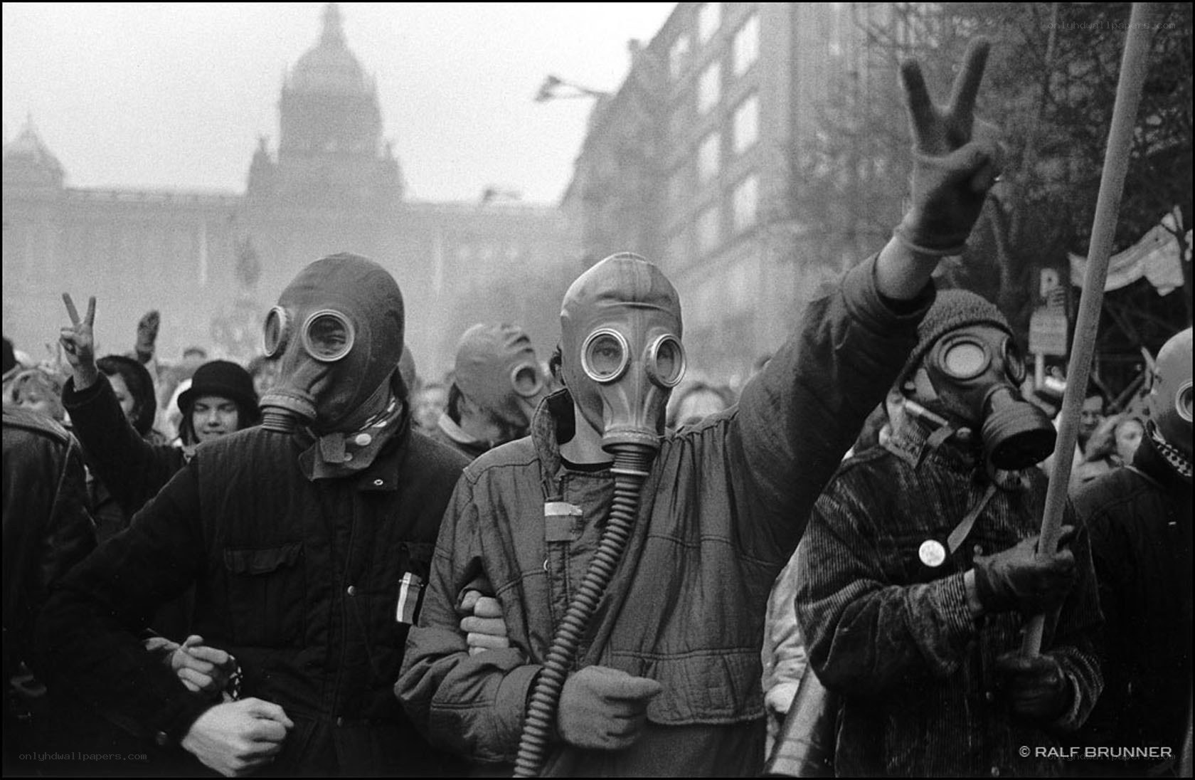Protesters in gas masks