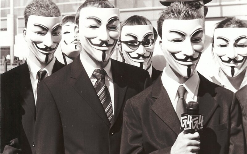 protesters in guy fawkes masks
