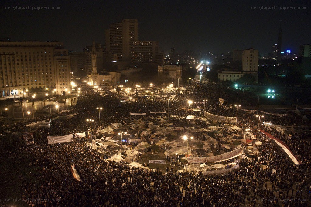 Protesters in Tahrir Square at night