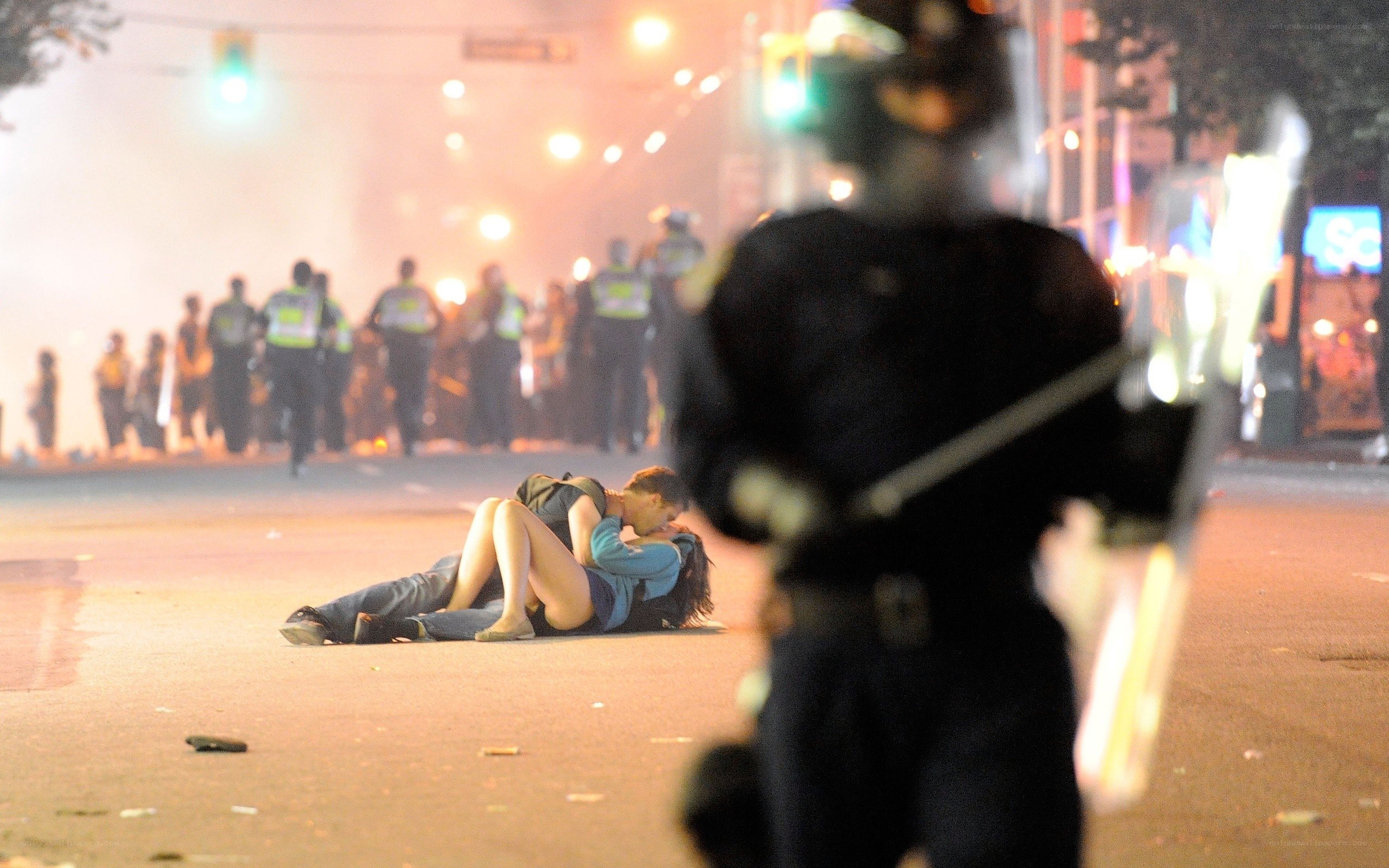 Protesters on street at night