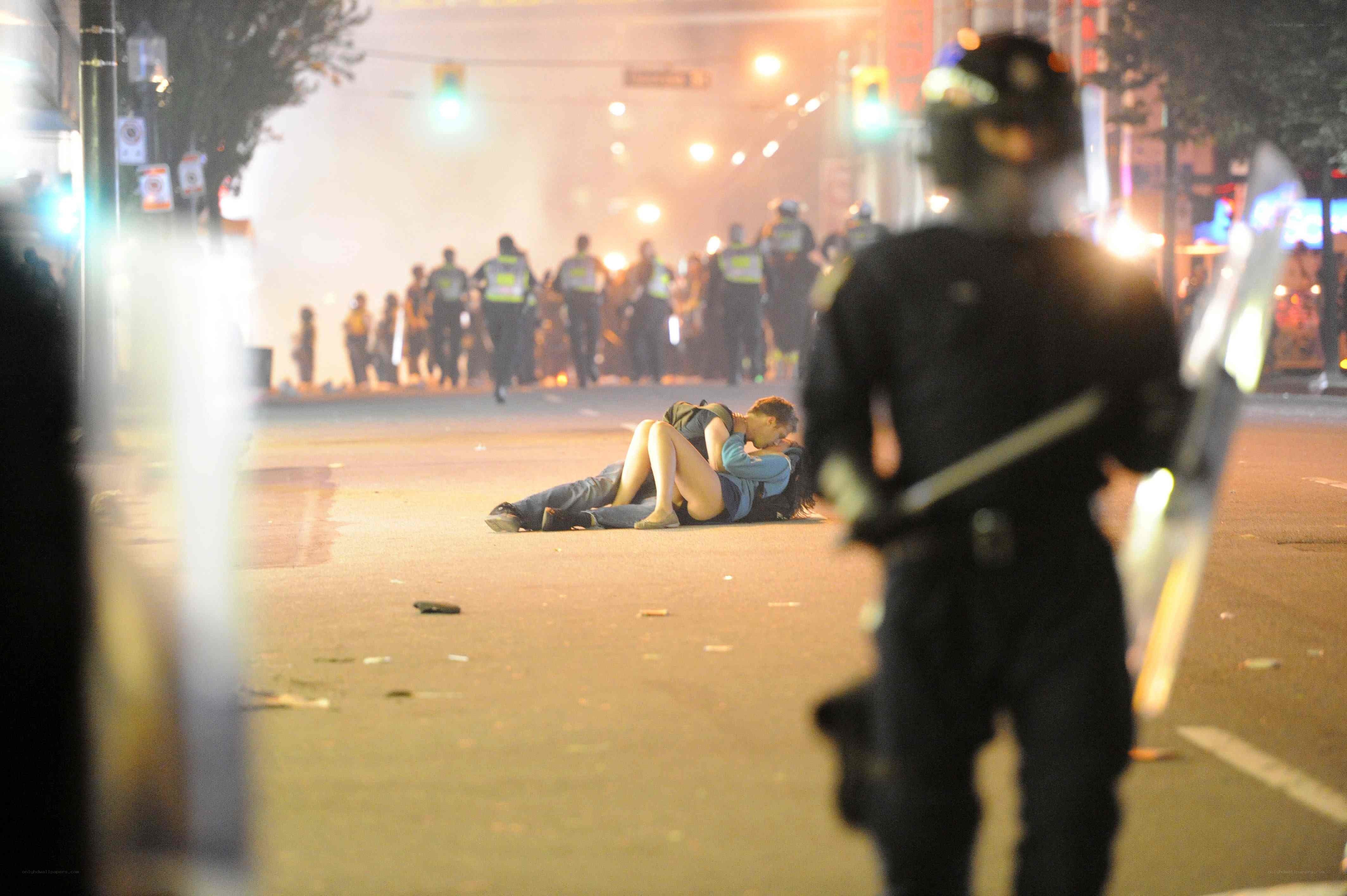 Protesters on street at night