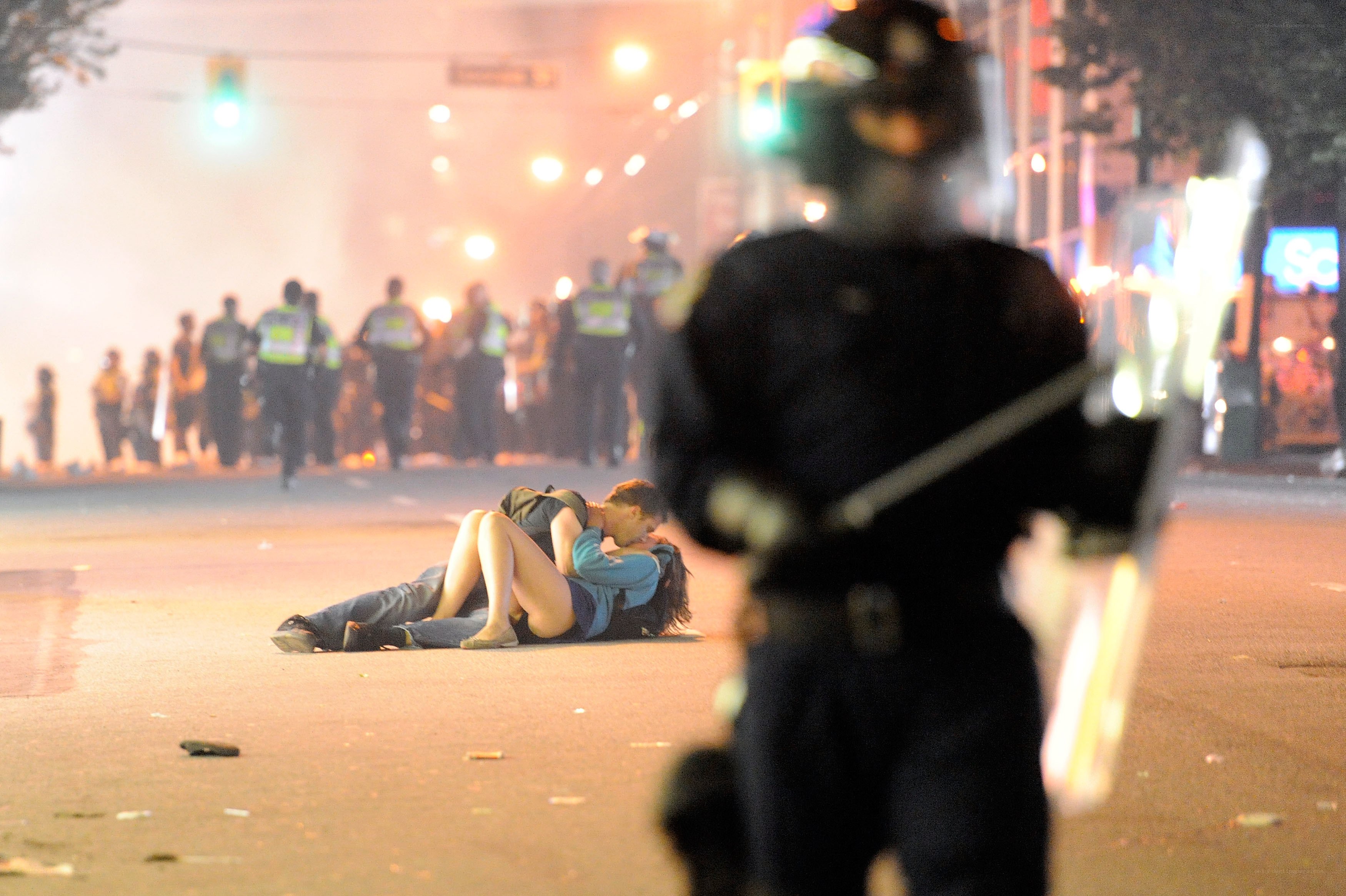 Protesters on street at night