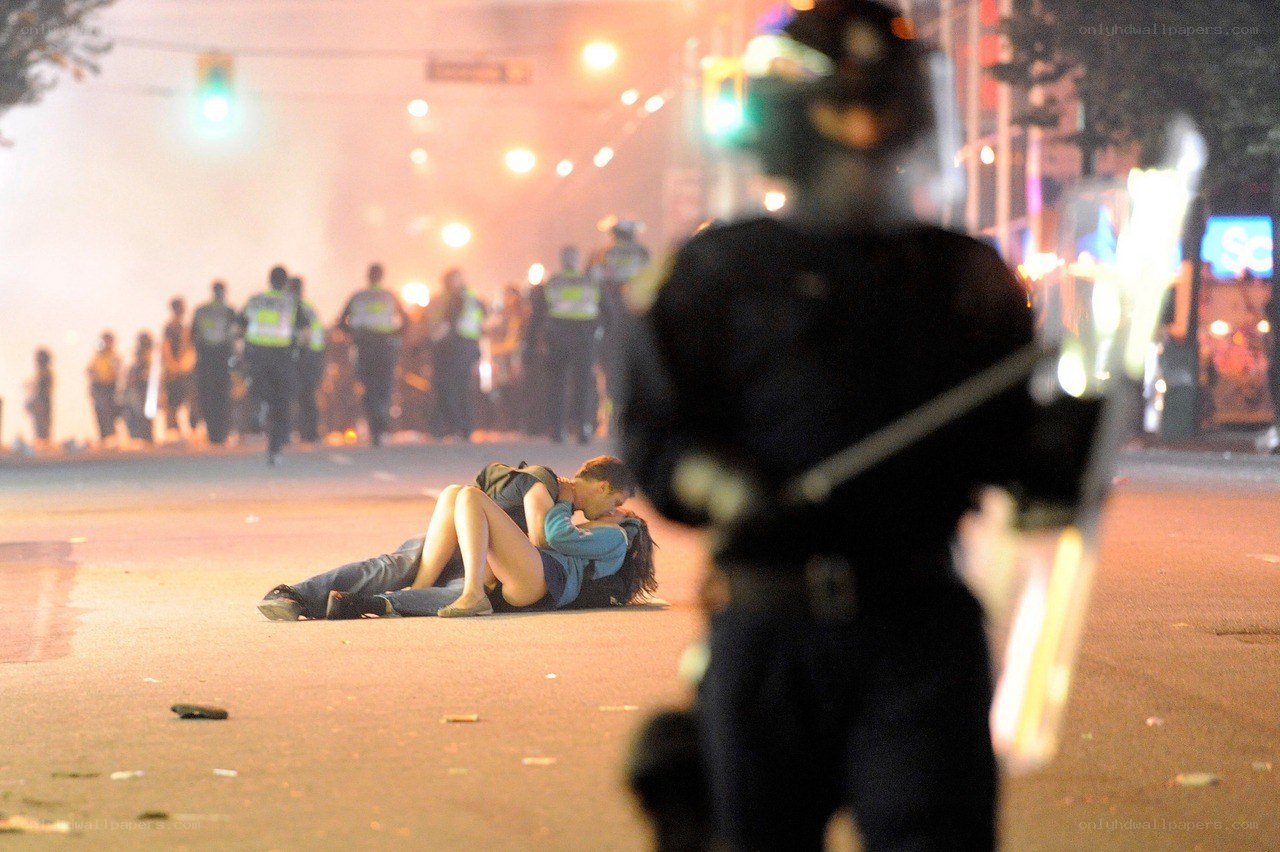 Protesters on street at night