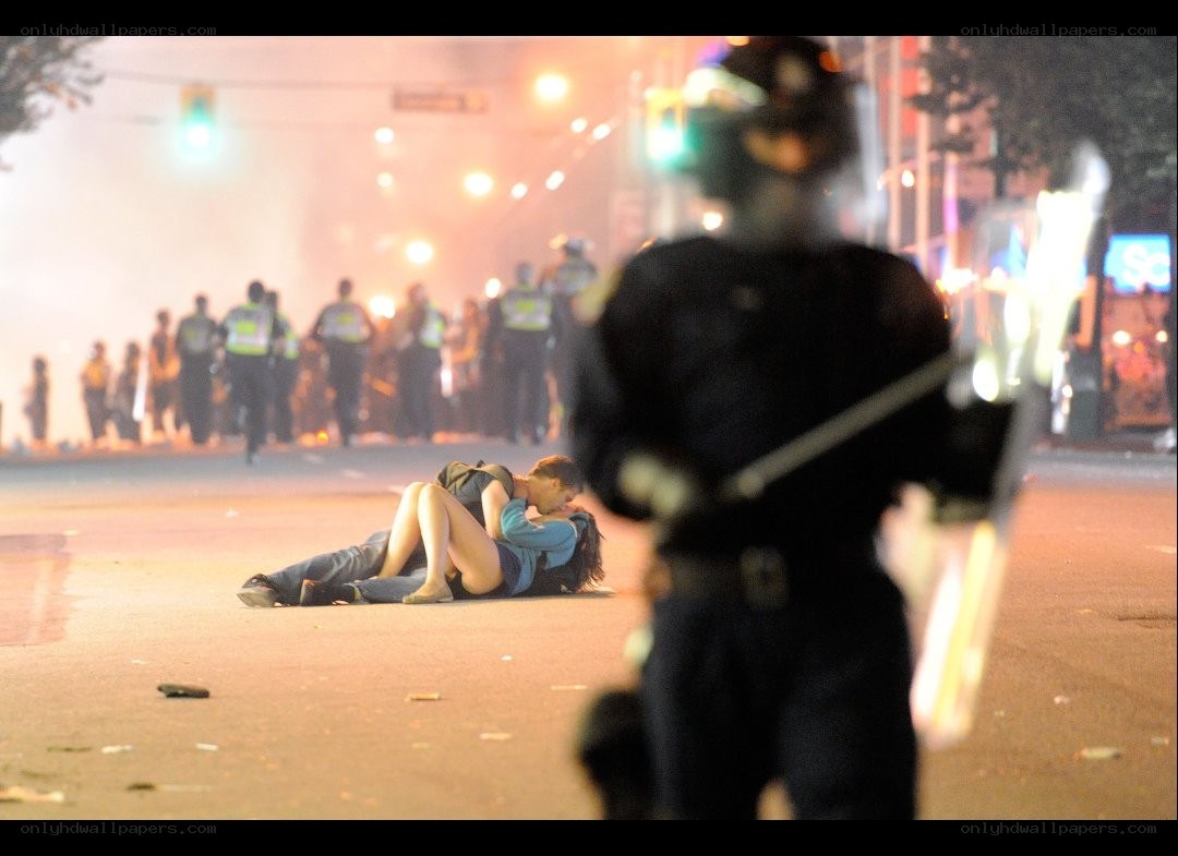 Protesters on street at night