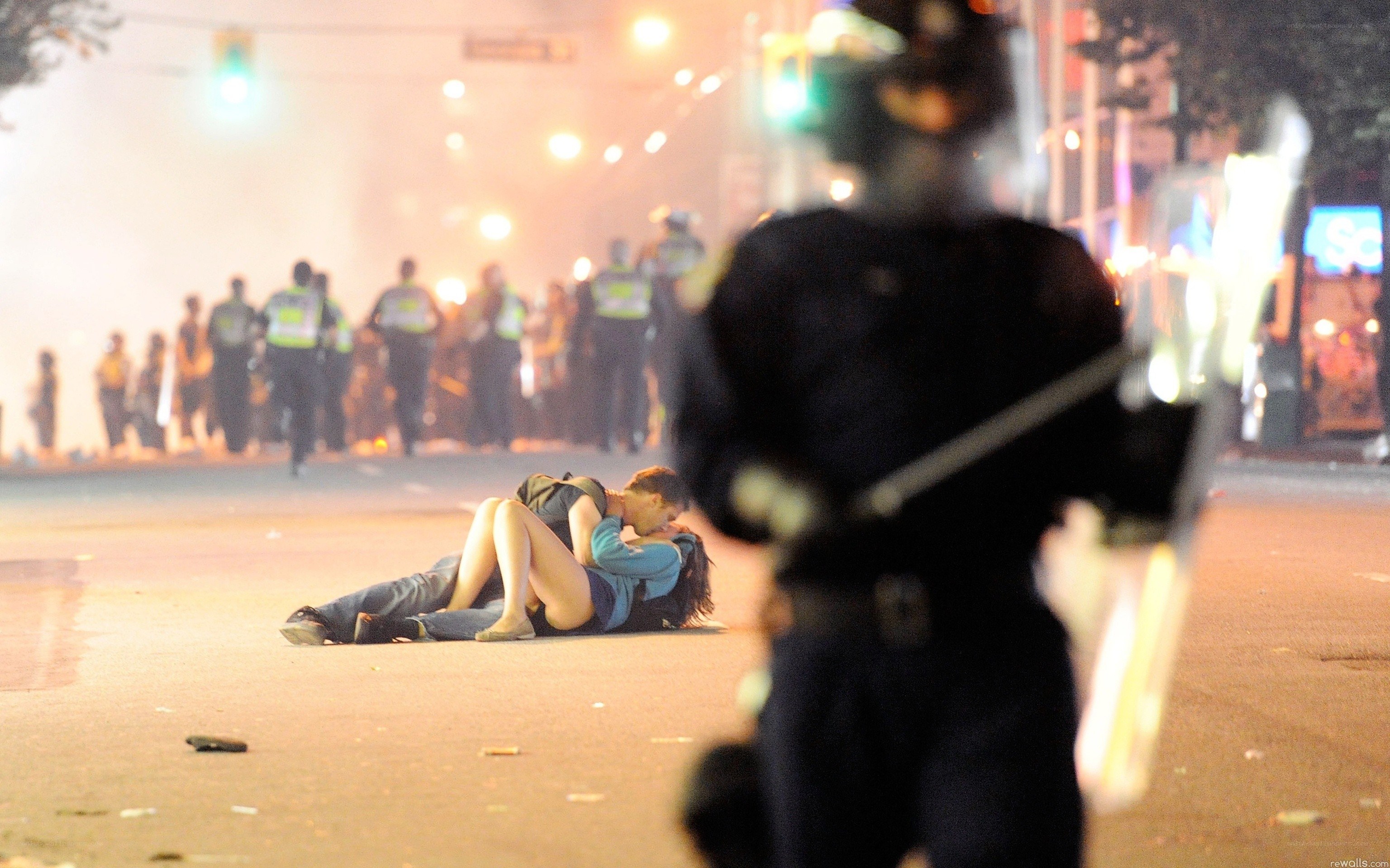 Protesters on street at night