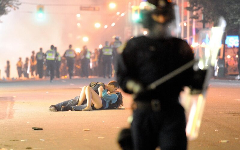Protesters on street at night