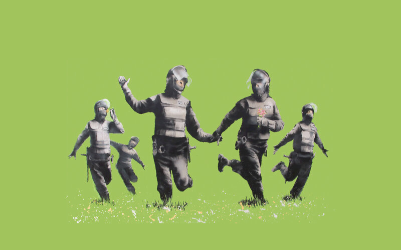 Protesters running with flowers