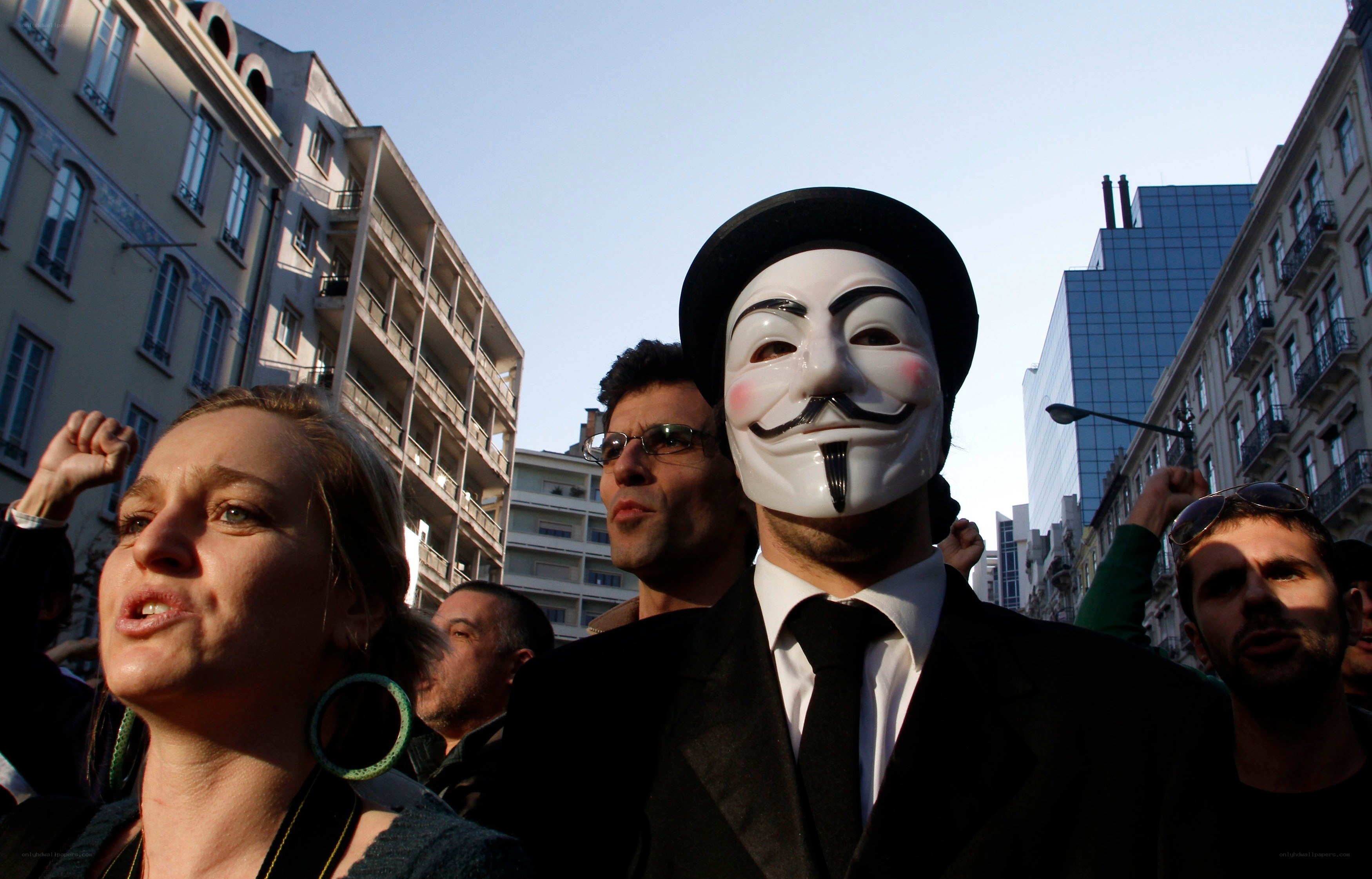 Protesters with Guy Fawkes mask