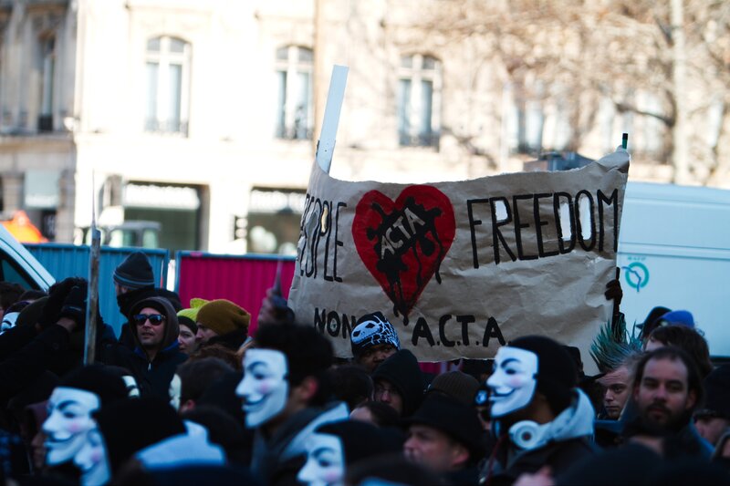 Protesters with Guy Fawkes masks