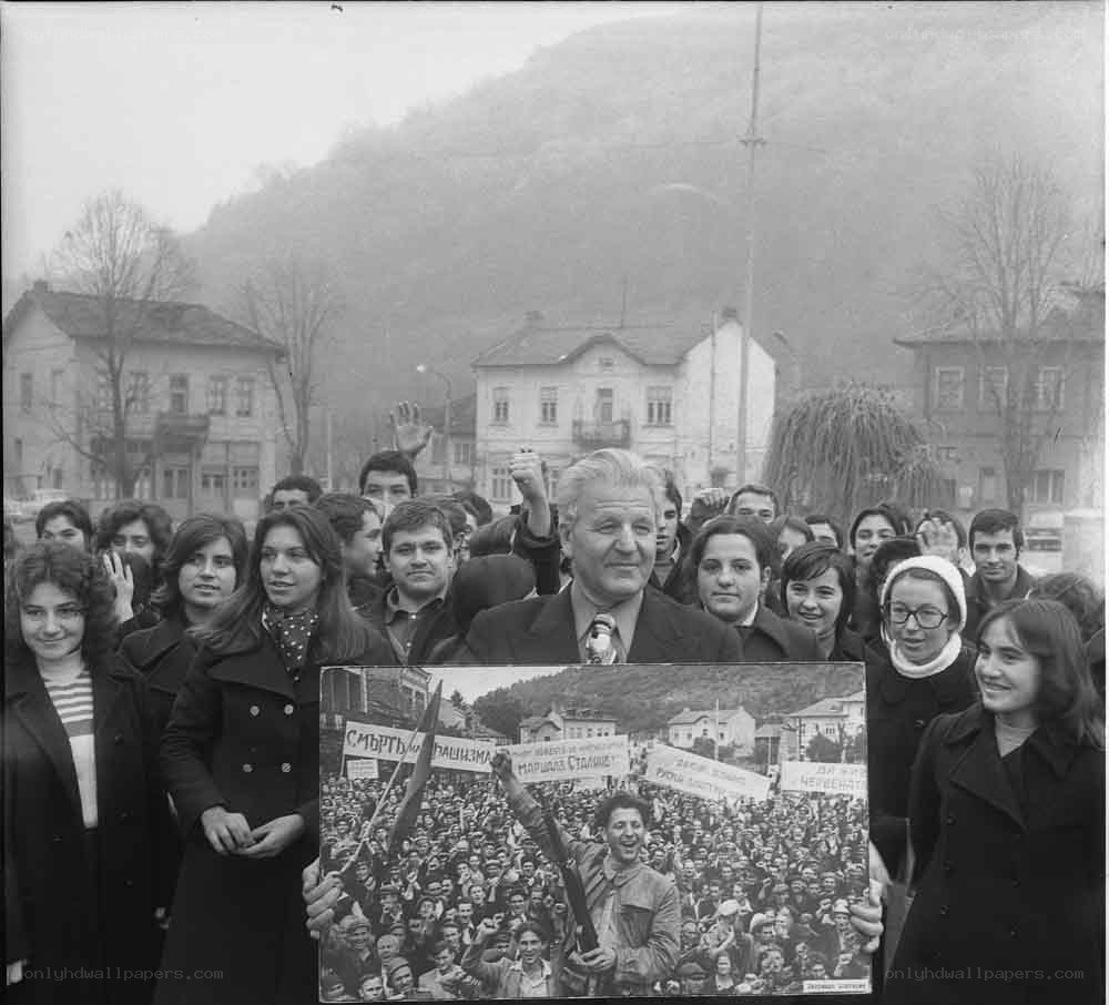 Protesters with historical photo