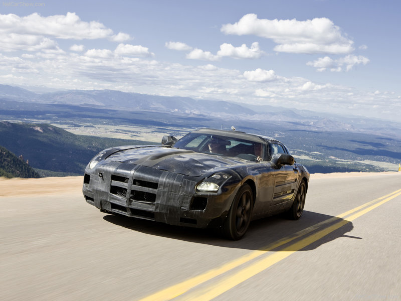 prototype sports car on mountain road