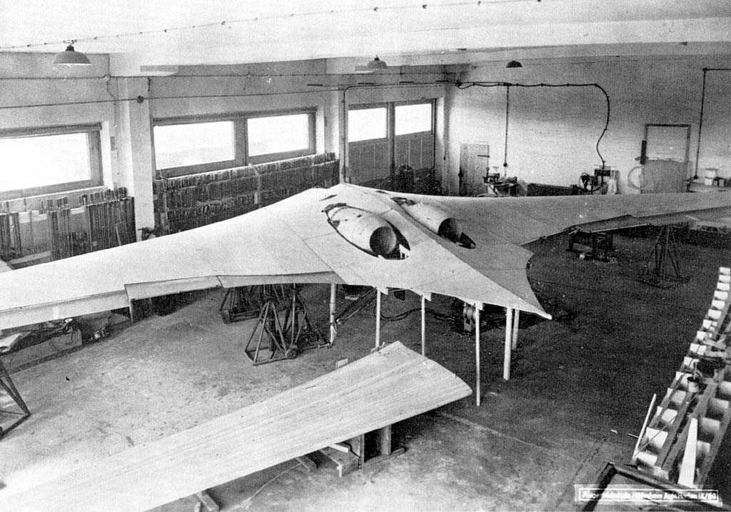 prototype stealth aircraft in workshop