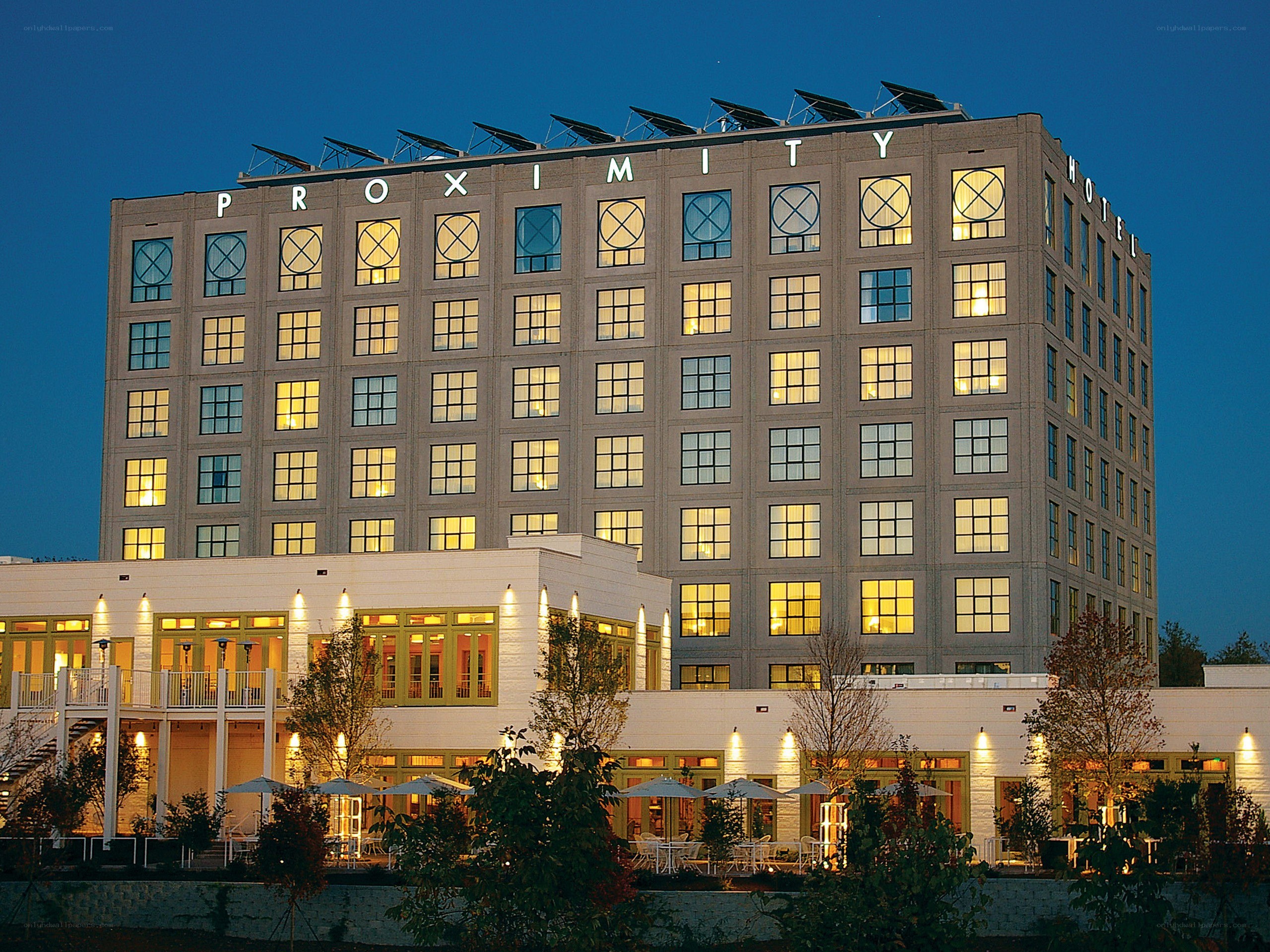 Proximity Hotel at dusk