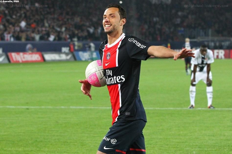 PSG player celebrating with ball