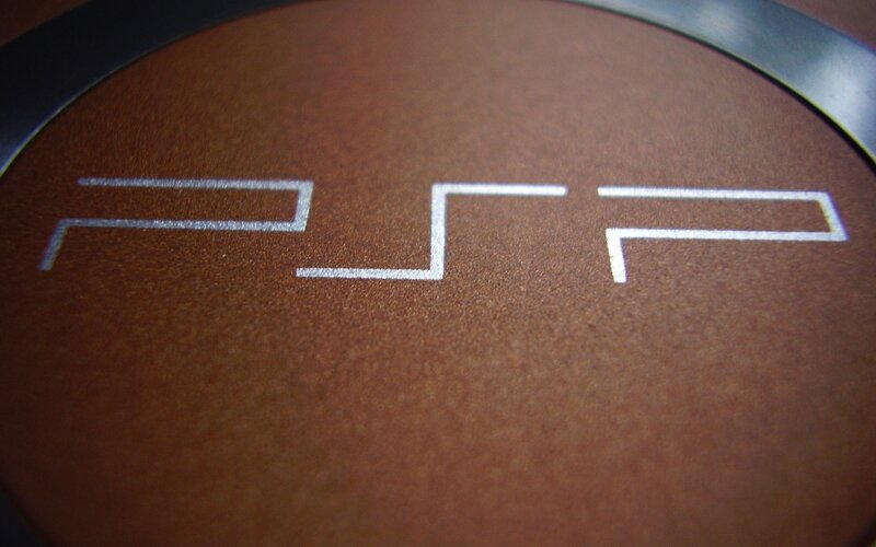 PSP logo on brown surface