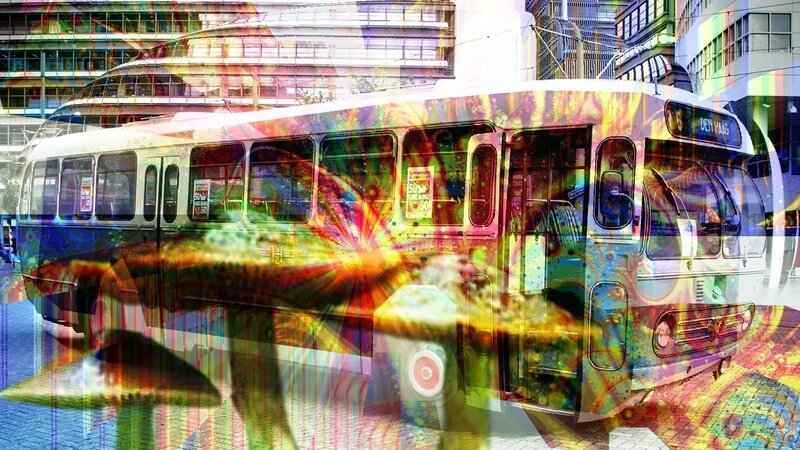 Psychedelic Bus in City — Yellow