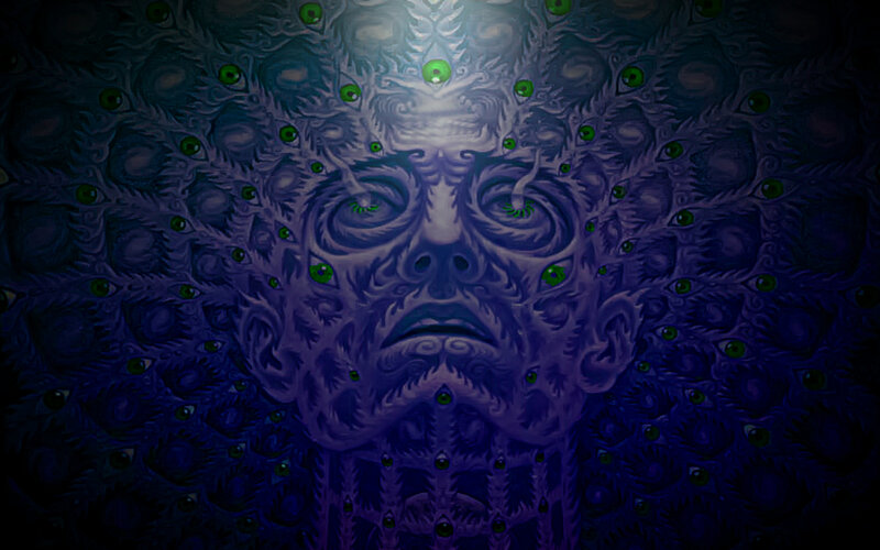 psychedelic face with green eyes