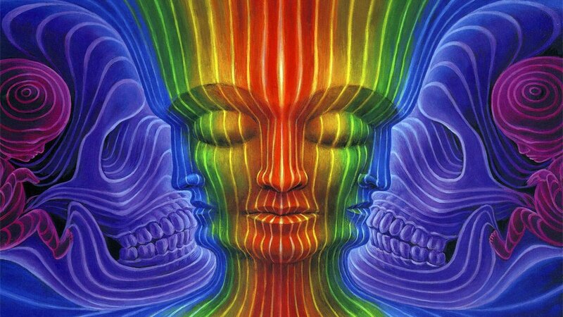 Psychedelic face with skulls