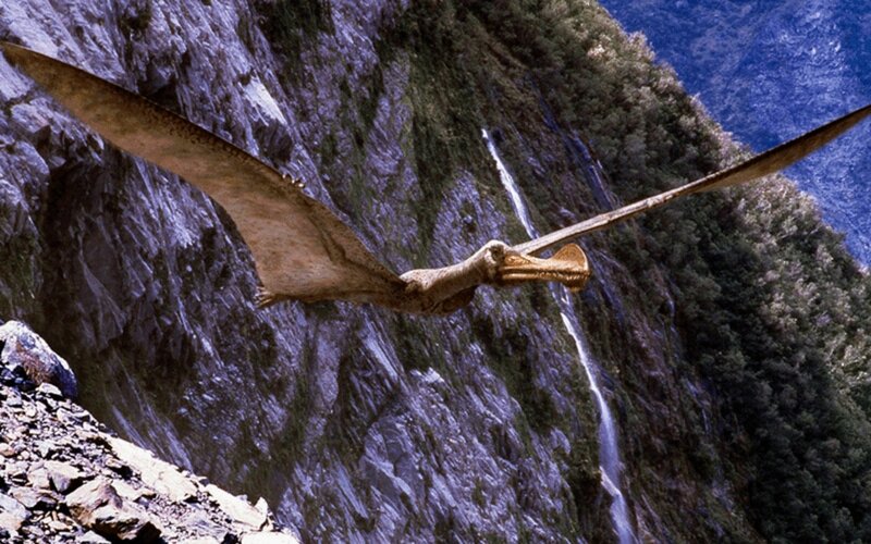 Pteranodon flying over mountains