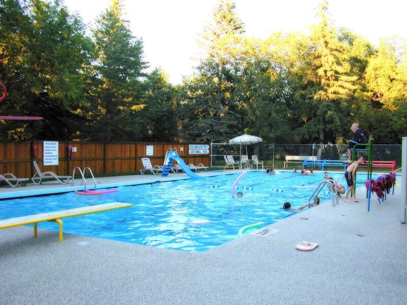 Public pool with children swimming