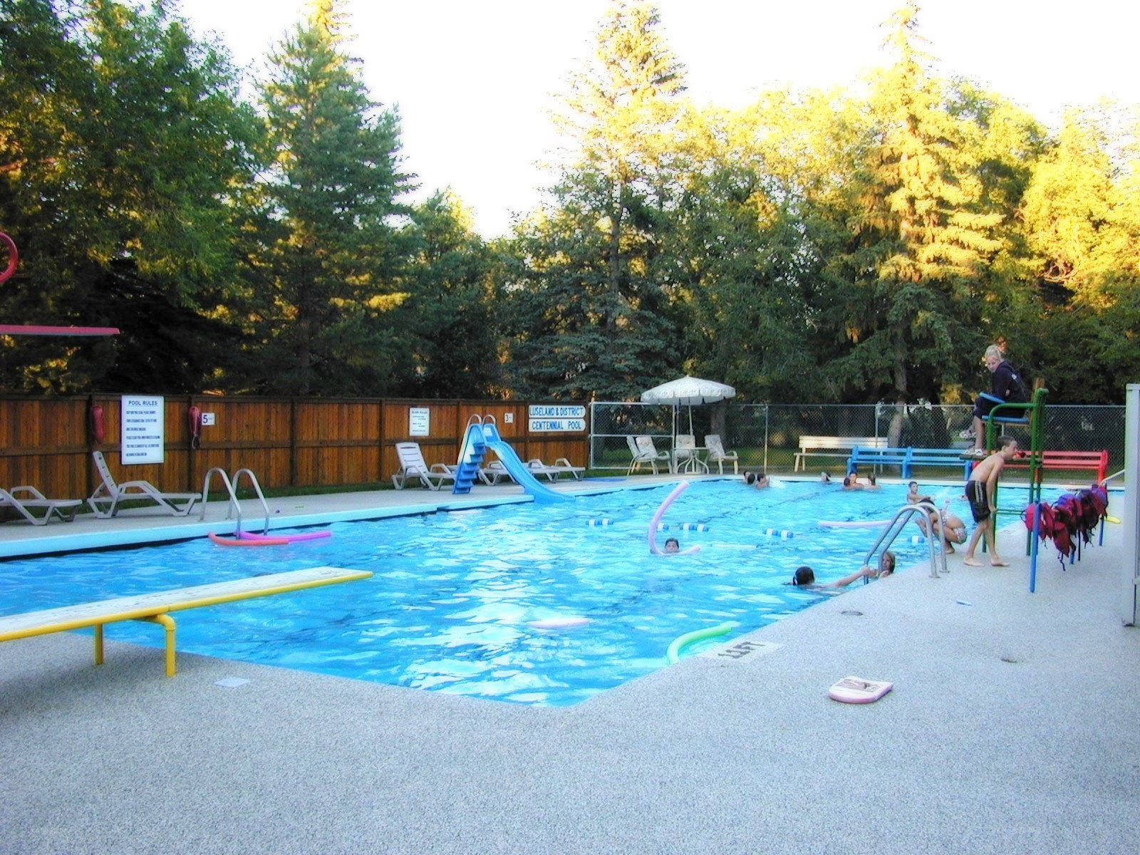 Public pool with children swimming