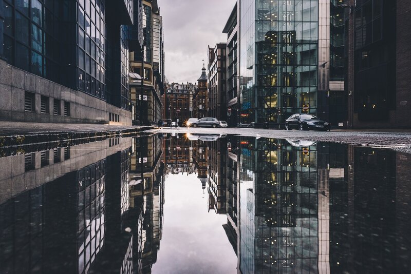Puddle Reflecting Buildings