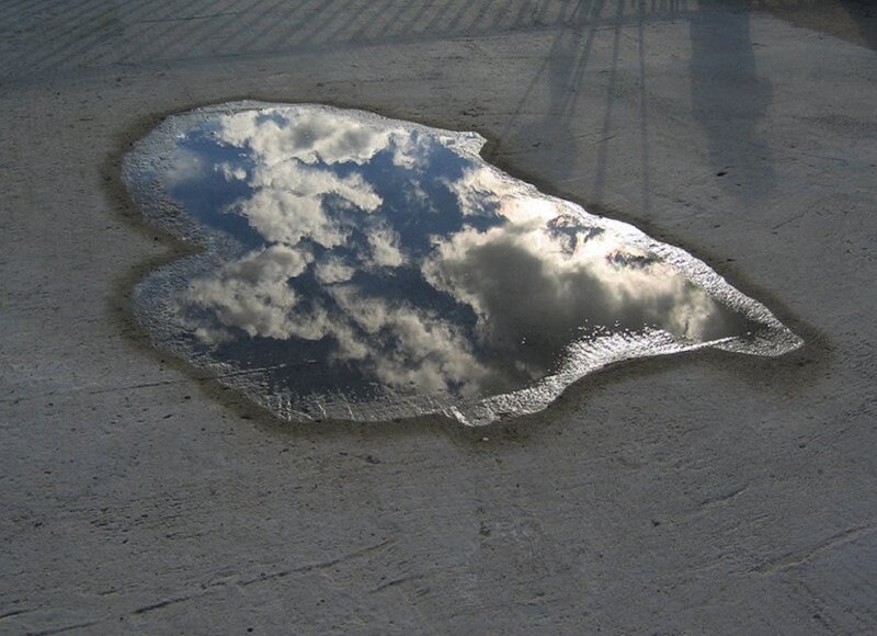 Puddle Reflecting Clouds