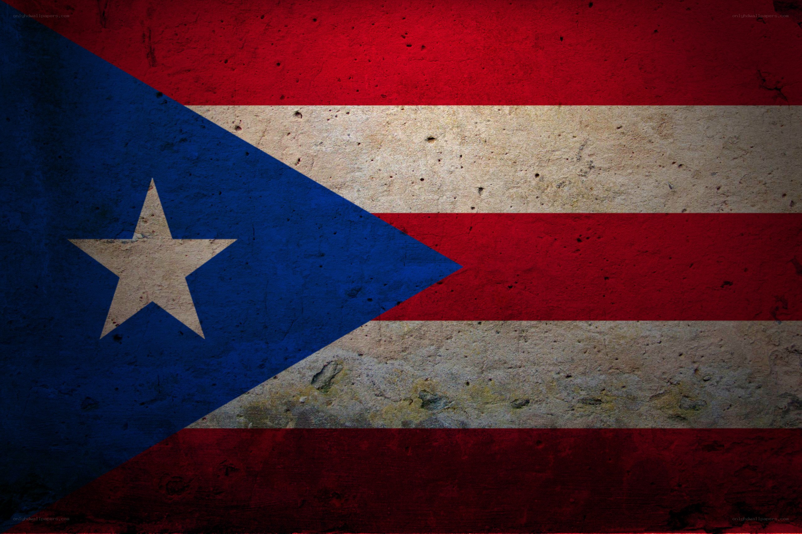 Puerto Rican flag on textured wall