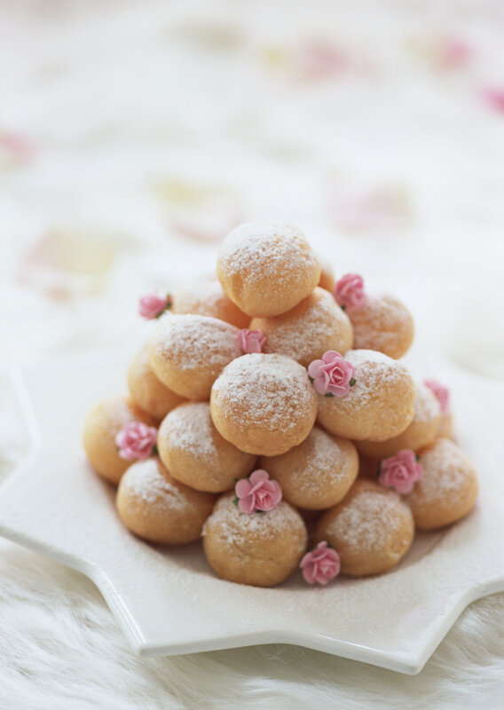 Puffed pastries with pink flowers