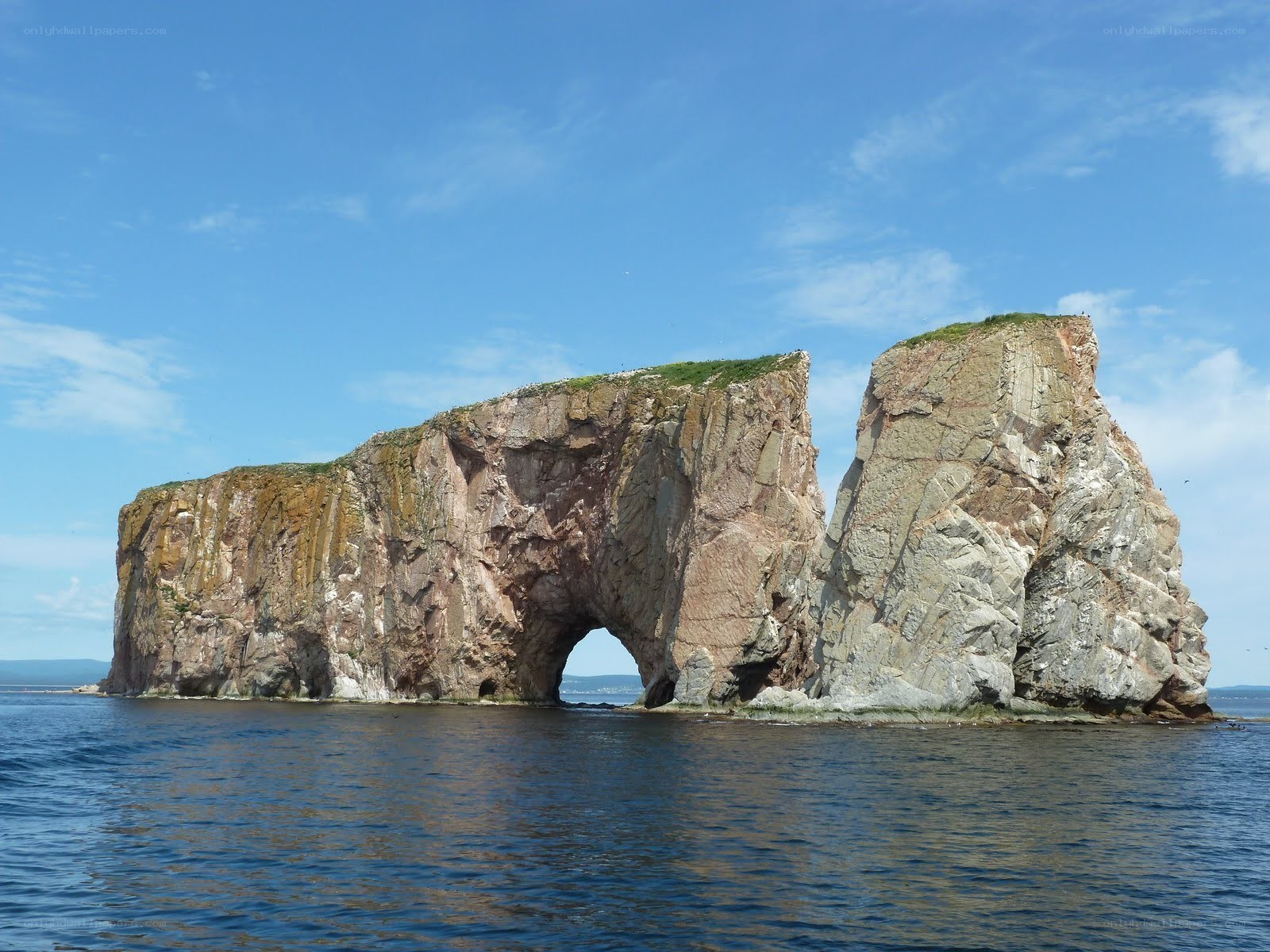 Puffin Island with natural arch