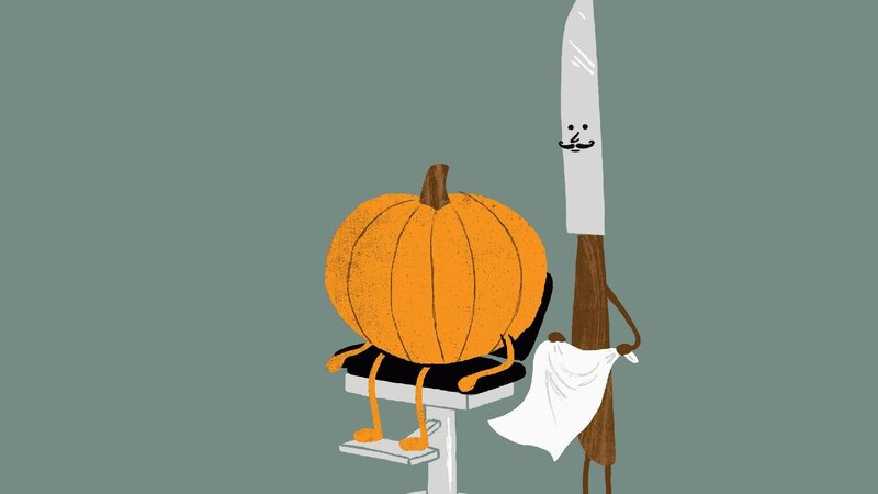 Pumpkin Character in Chair