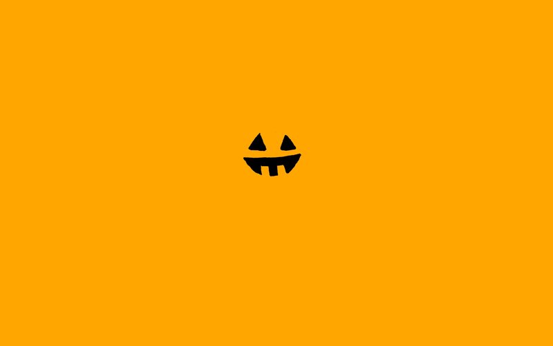 pumpkin face on orange