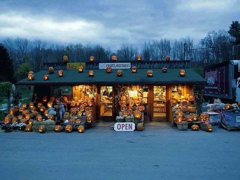 Pumpkin farm stand at dusk