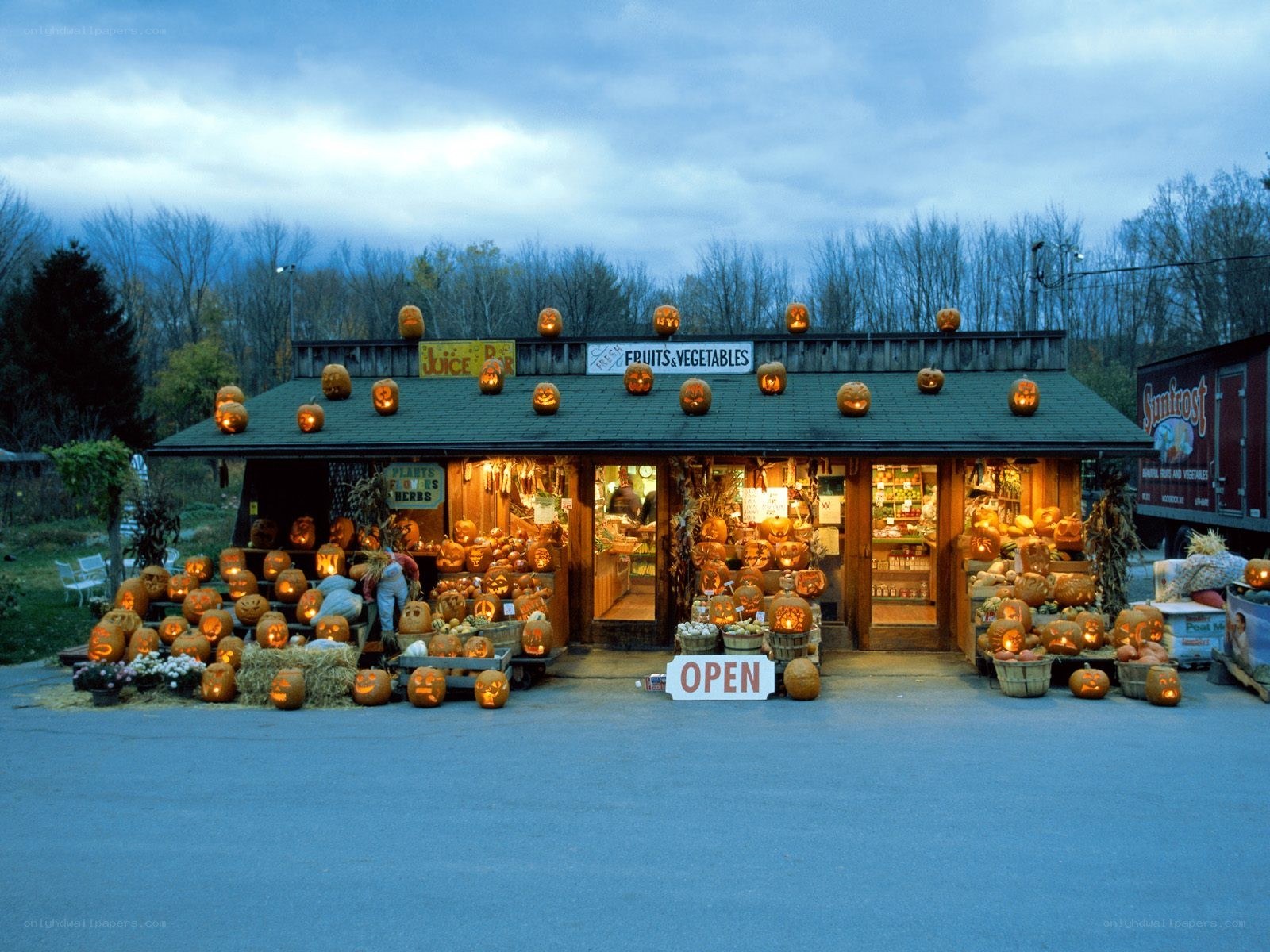 Pumpkin farm stand at dusk