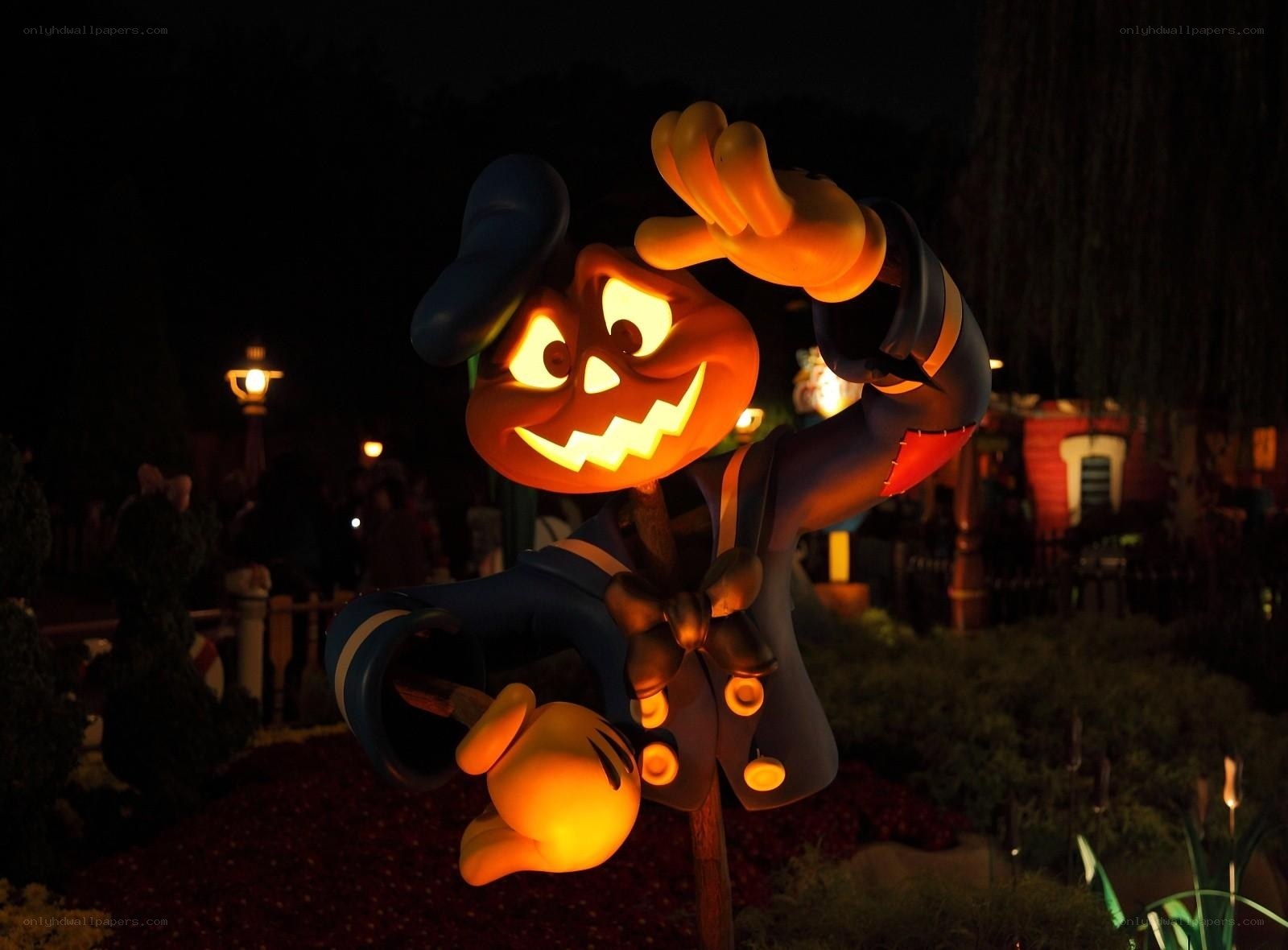Pumpkin Mickey at night
