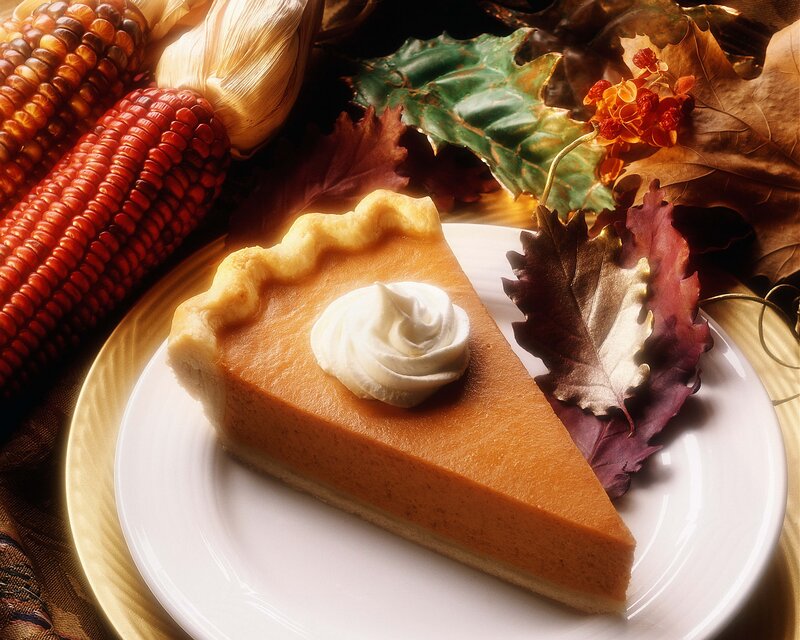 Pumpkin pie slice on plate