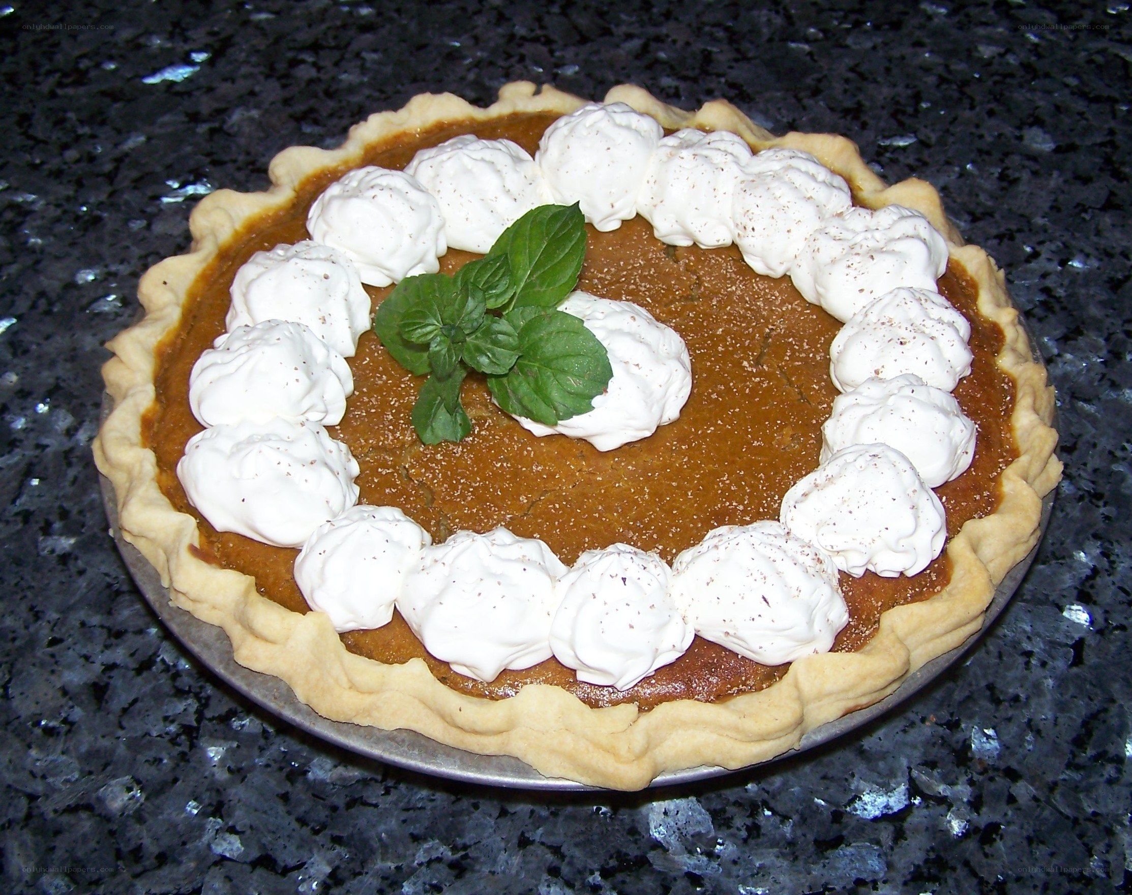 Pumpkin pie with whipped cream