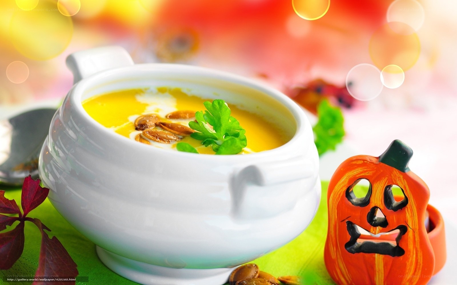 Pumpkin soup with jack-o-lantern