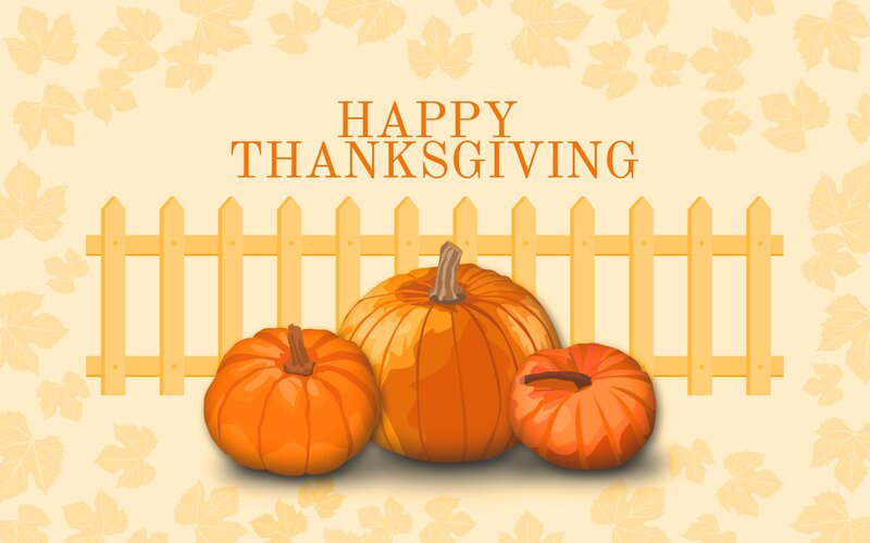 Pumpkins by Fence
