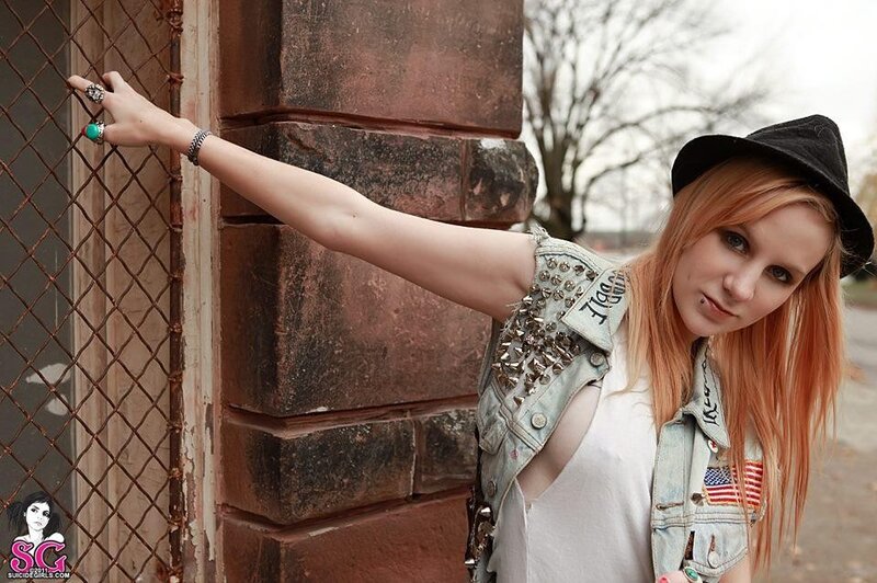 punk girl with studded vest