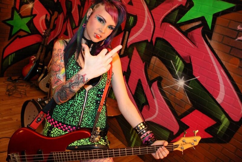punk musician with bass guitar