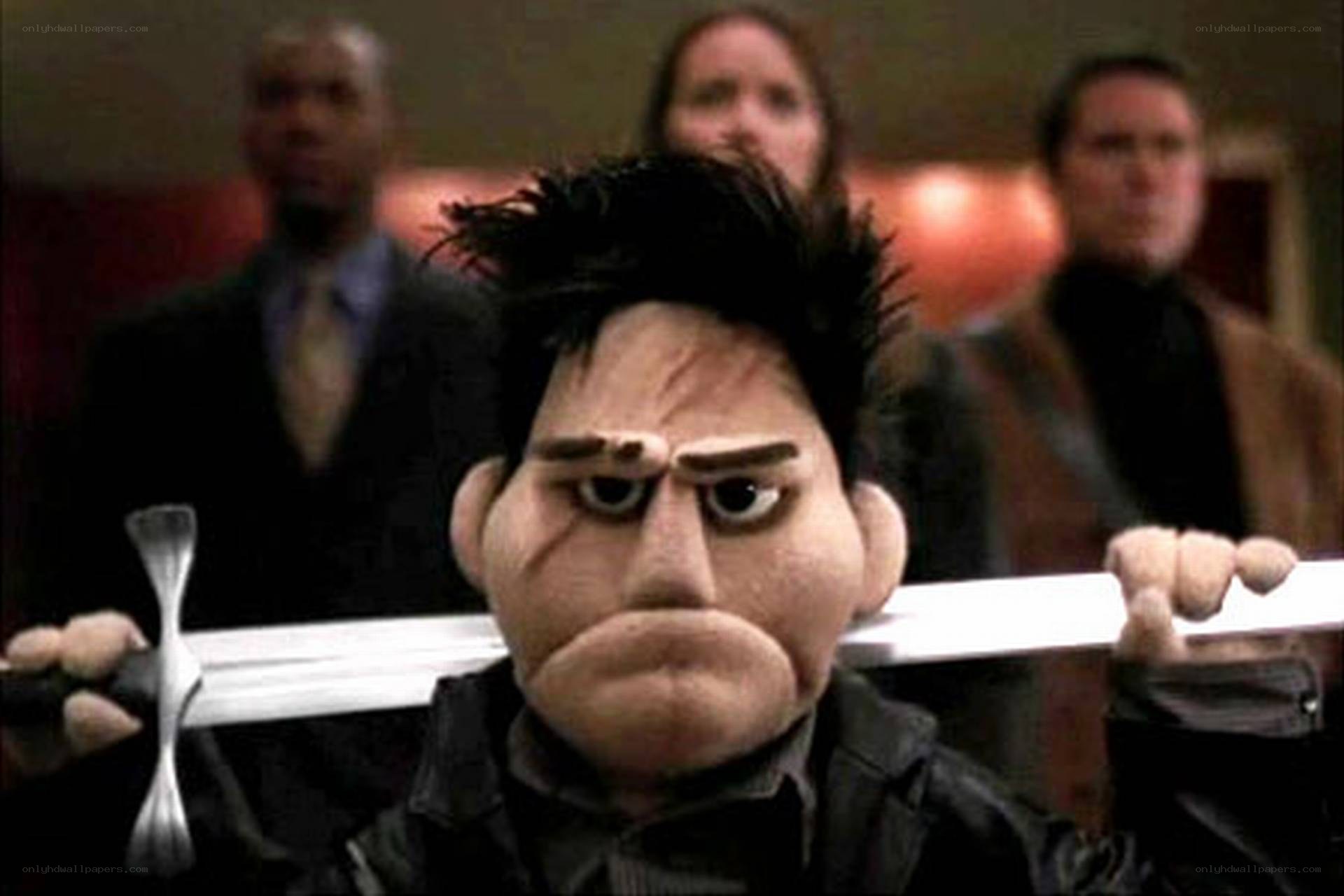 puppet with sword in hand