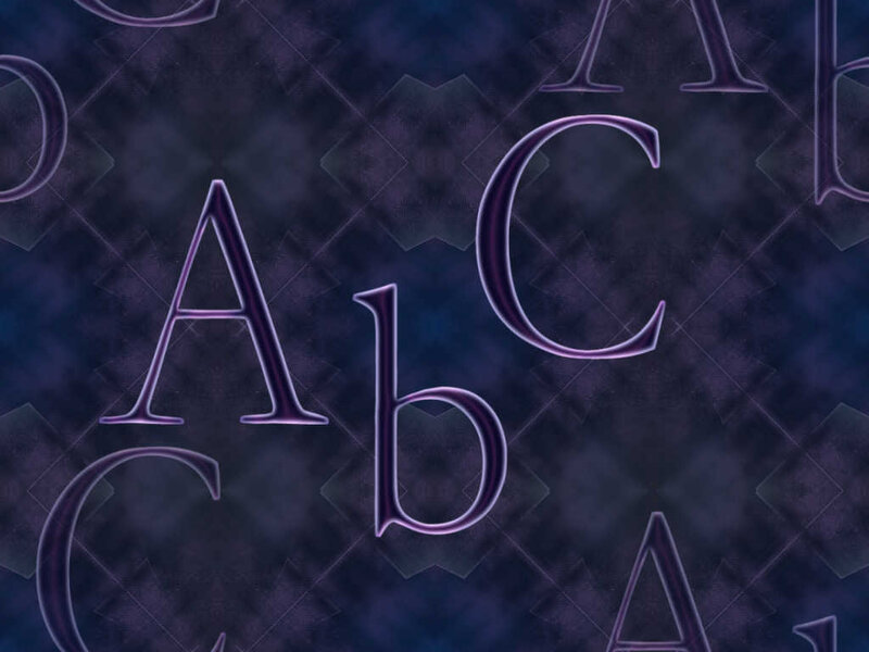 purple alphabet letters on dark background