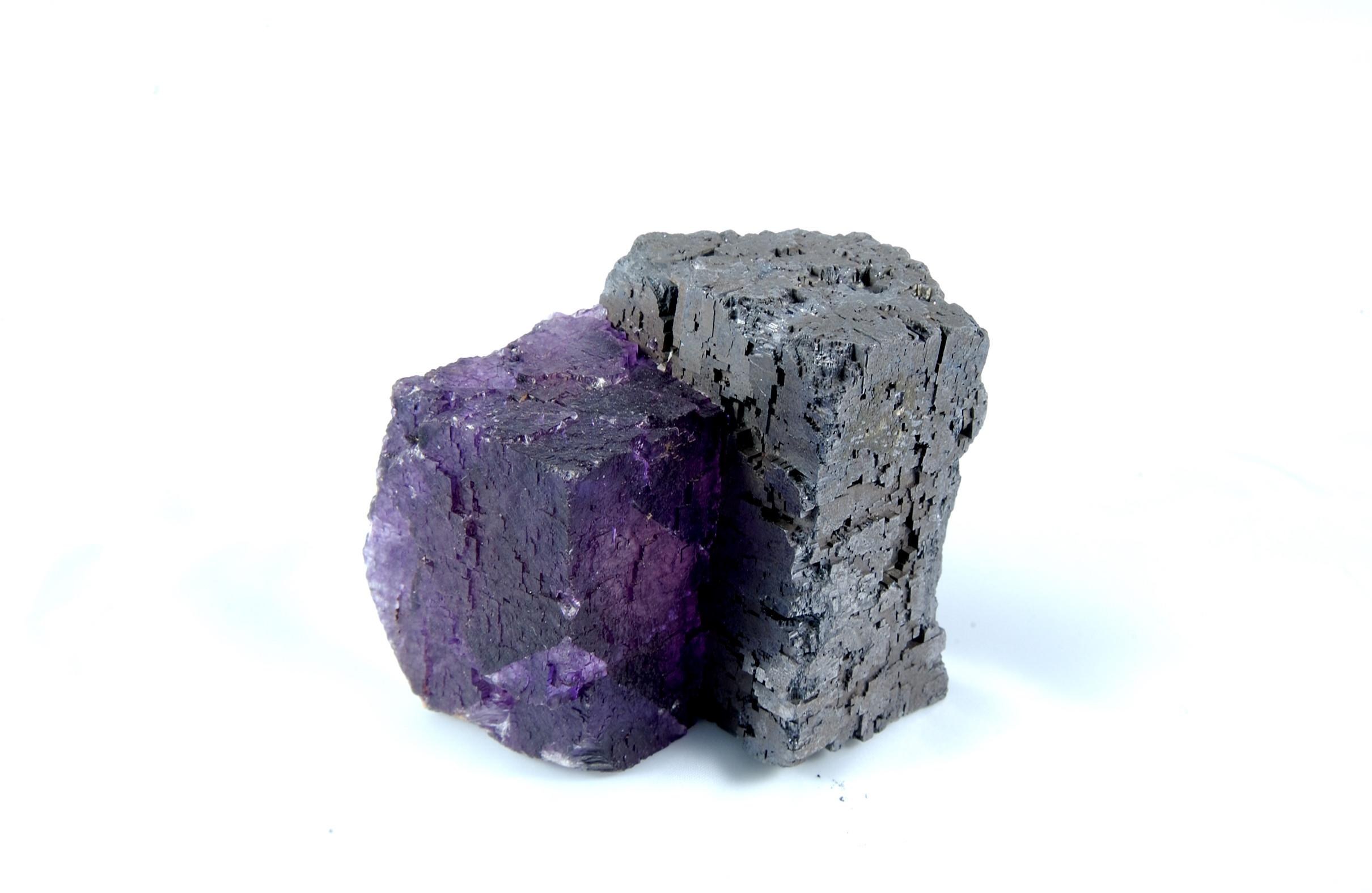 purple and black mineral specimens