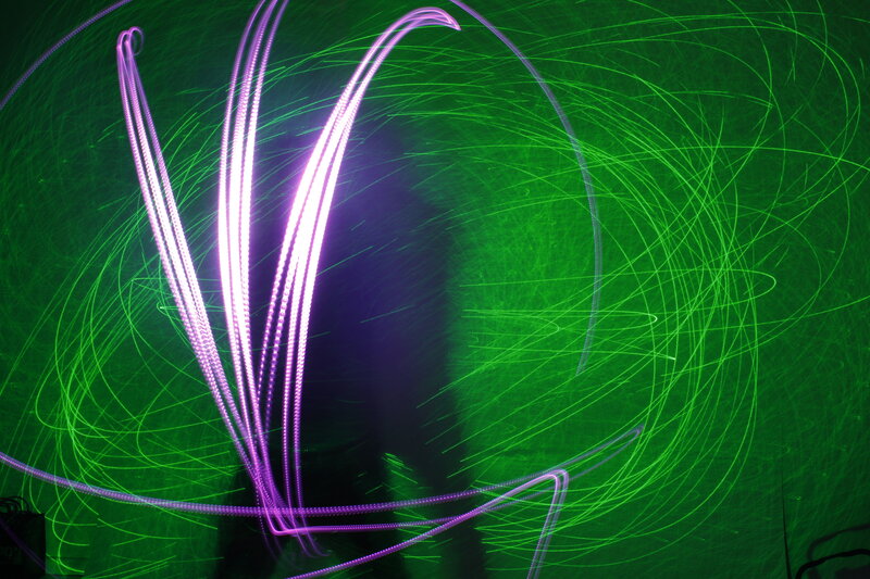 Purple and Green Light Trails